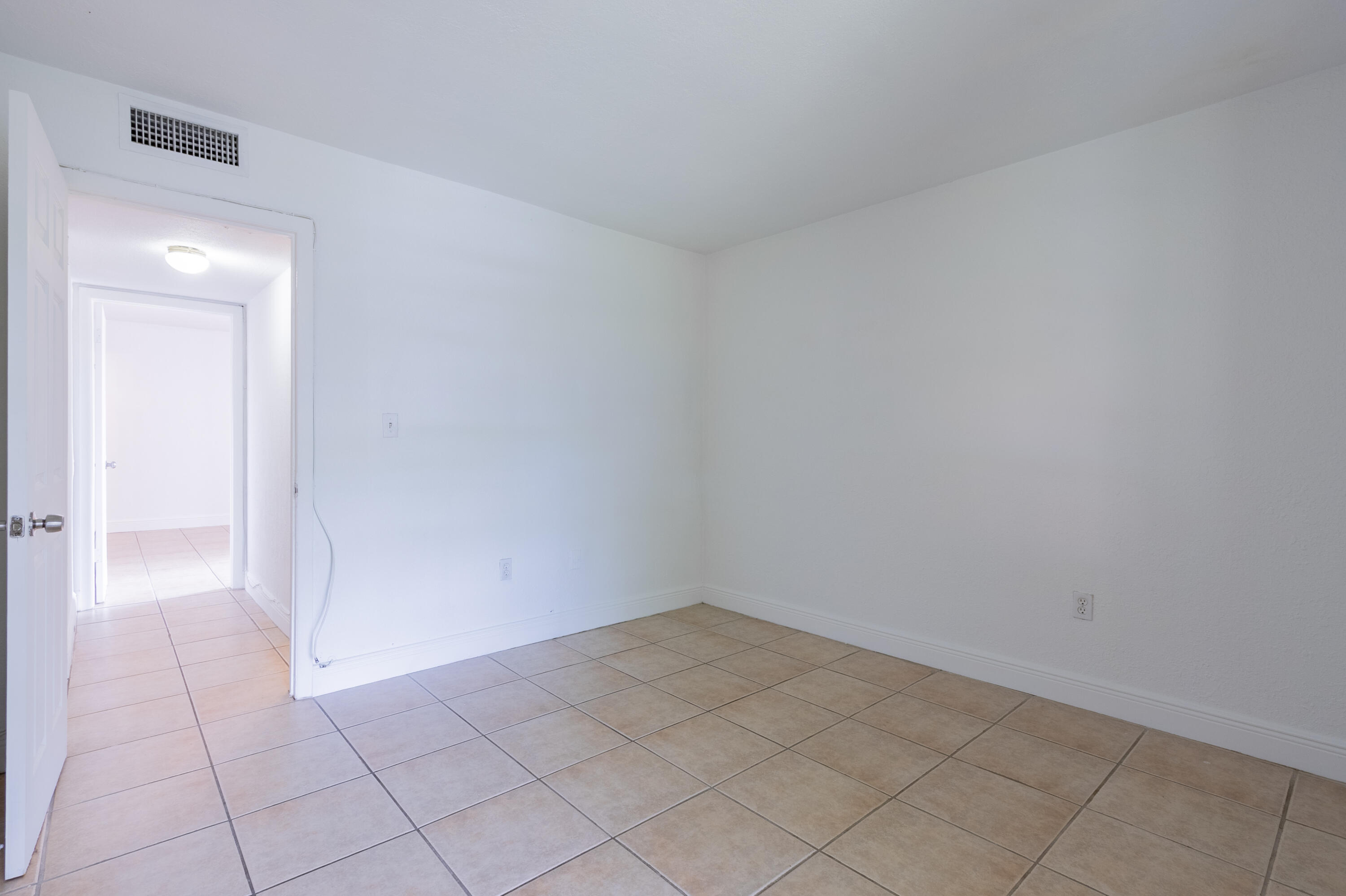 9459 Southwest 76th Street, Unit R8 Miami, FL 33173 - Photo 11 of 21 a view of an empty room