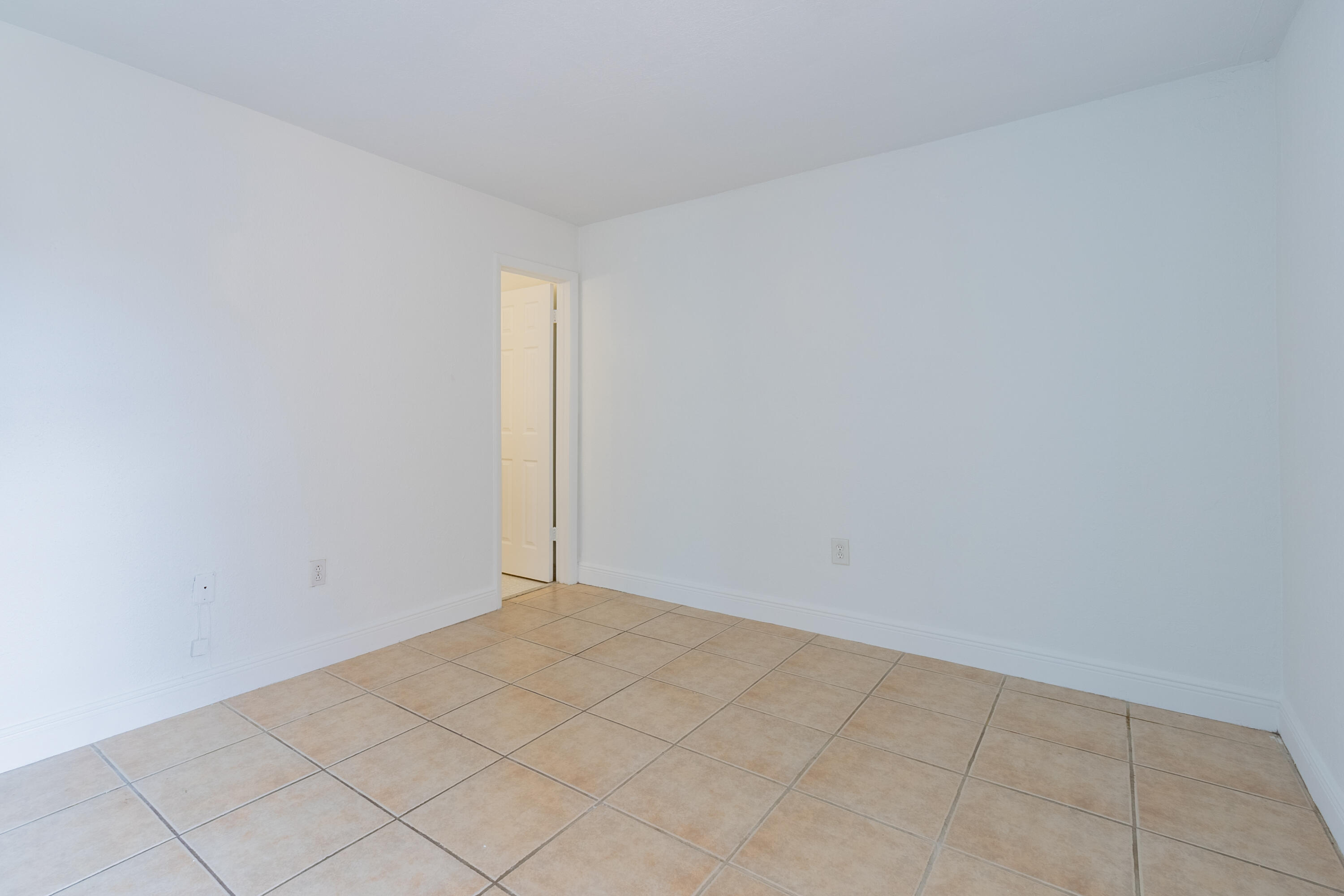 9459 Southwest 76th Street, Unit R8 Miami, FL 33173 - Photo 16 of 21 a view of an empty room