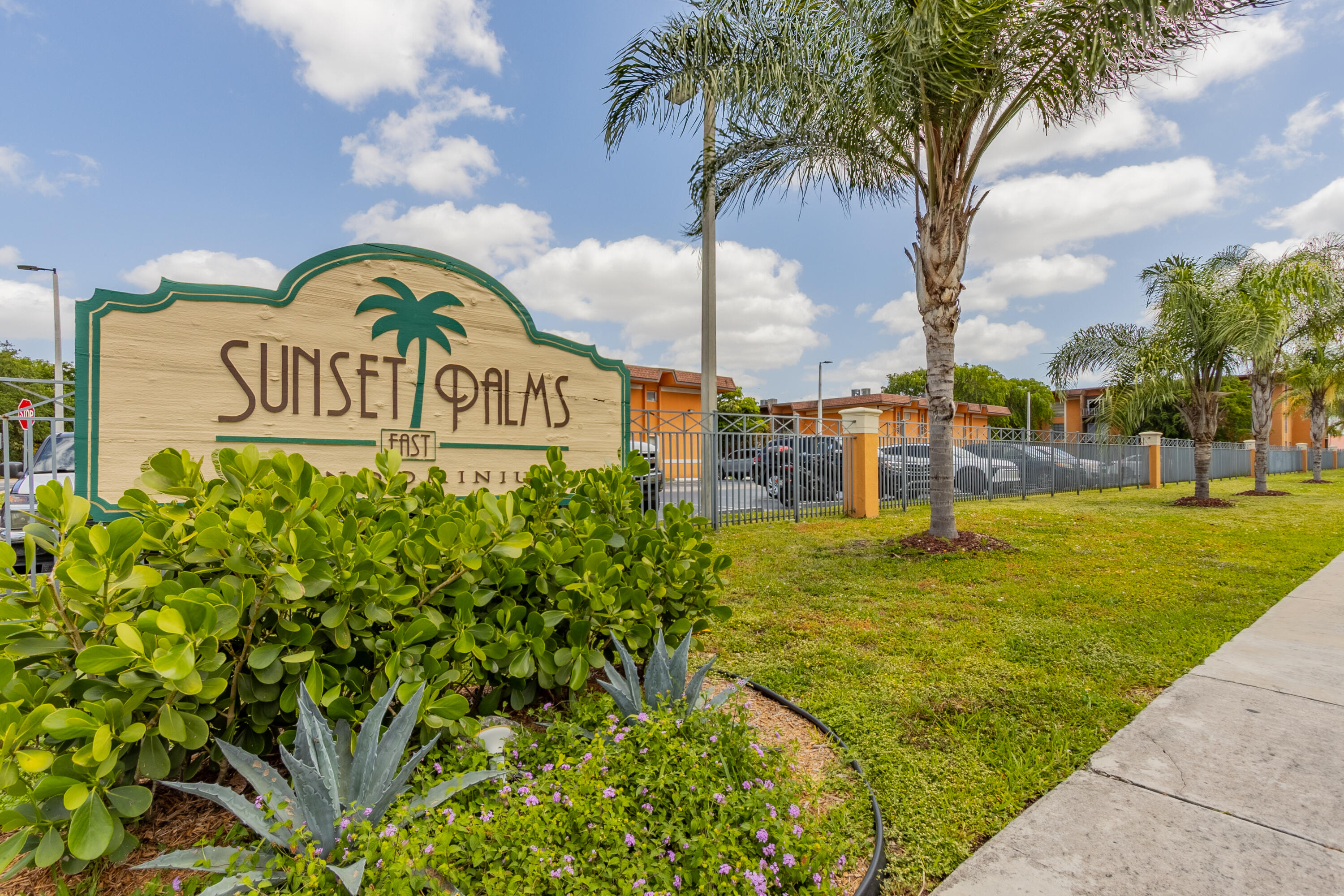 9459 Southwest 76th Street, Unit R8 Miami, FL 33173 - Photo 21 of 21 a view of a sign board with a big yard