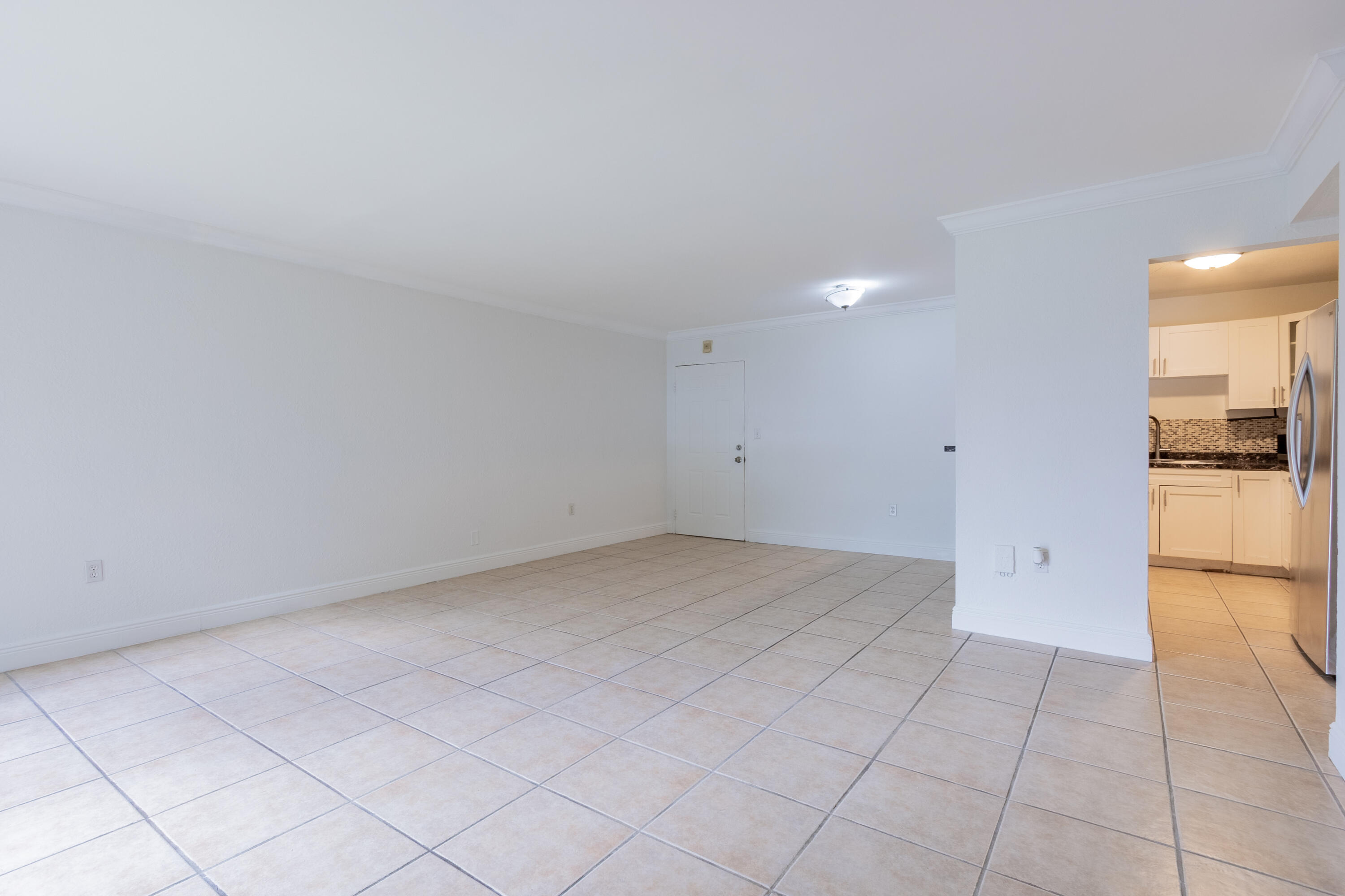 9459 Southwest 76th Street, Unit R8 Miami, FL 33173 - Photo 5 of 21 a view of empty room