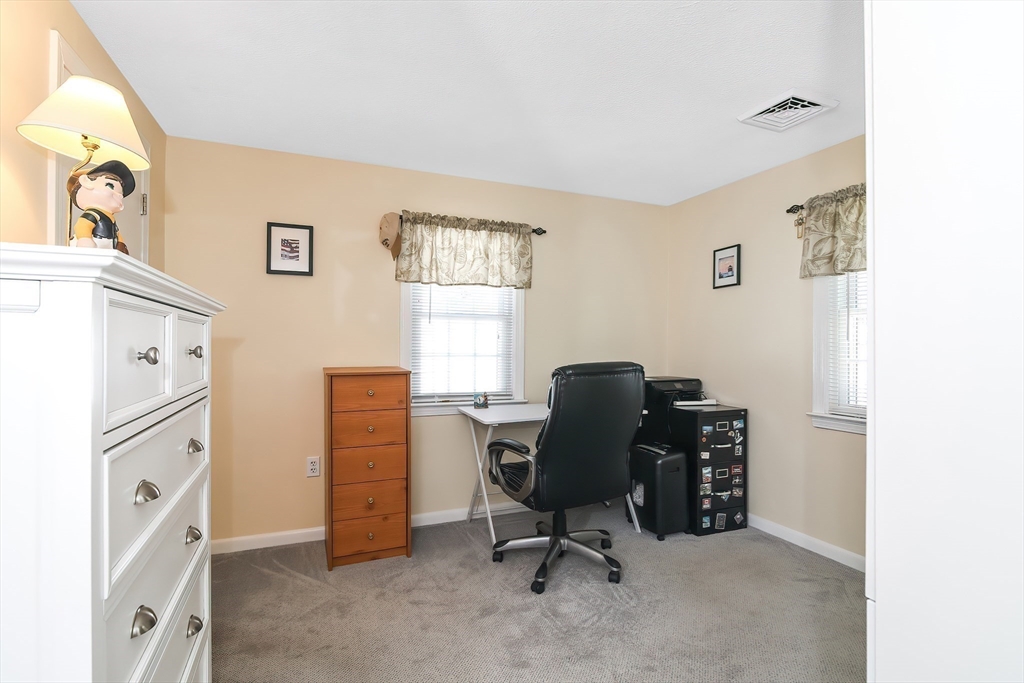 60 Security Street Barnstable, MA 02601 - Photo 21 of 32 a view of a workspace with furniture and a window