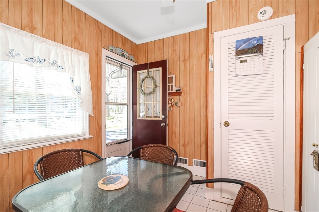 60 Security Street Barnstable, MA 02601 - Photo 25 of 32 a dining room with furniture and window