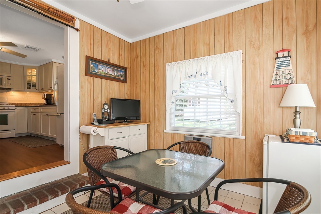 60 Security Street Barnstable, MA 02601 - Photo 26 of 32 a view of a dining room with furniture window and outside view