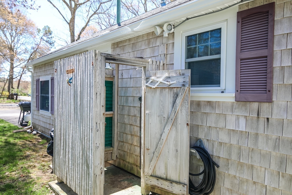 60 Security Street Barnstable, MA 02601 - Photo 27 of 32 a front view of a house with a shower