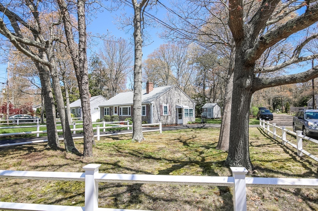 60 Security Street Barnstable, MA 02601 - Photo 30 of 32 a view of a large trees in front of a house
