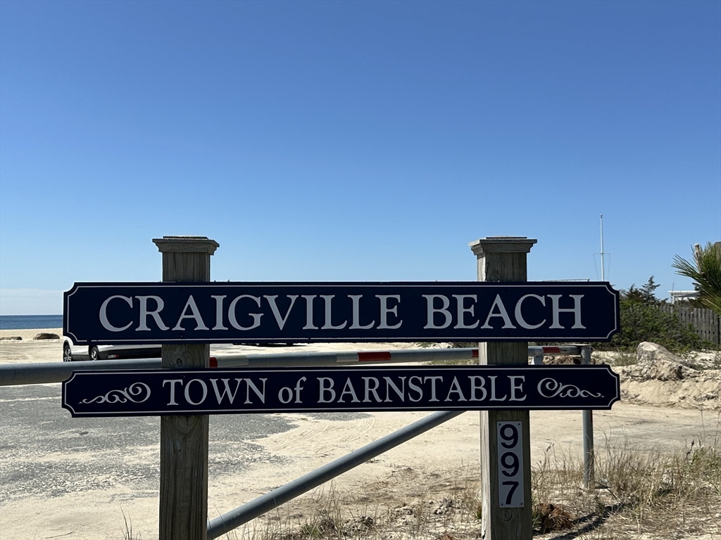 60 Security Street Barnstable, MA 02601 - Photo 31 of 32 a street sign that is on a pole