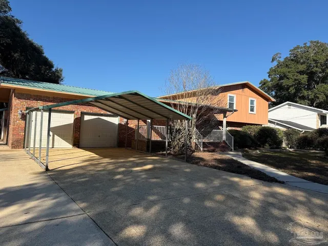 a view of residential houses with city view