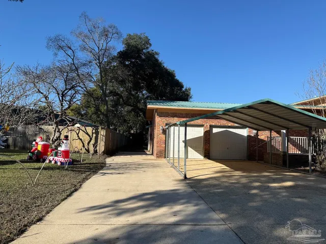 a view of parked car with garage