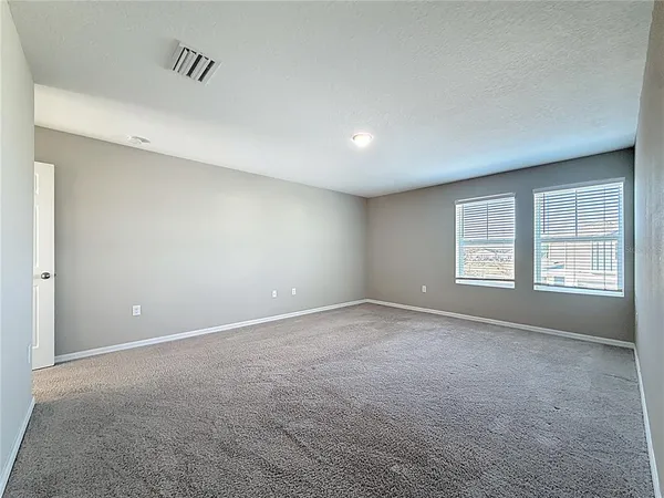 a view of an empty room with window