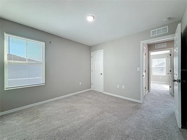 a view of storage and utility room with washer and dryer