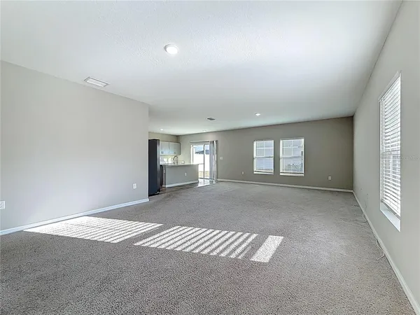 a view of a livingroom with a staircase