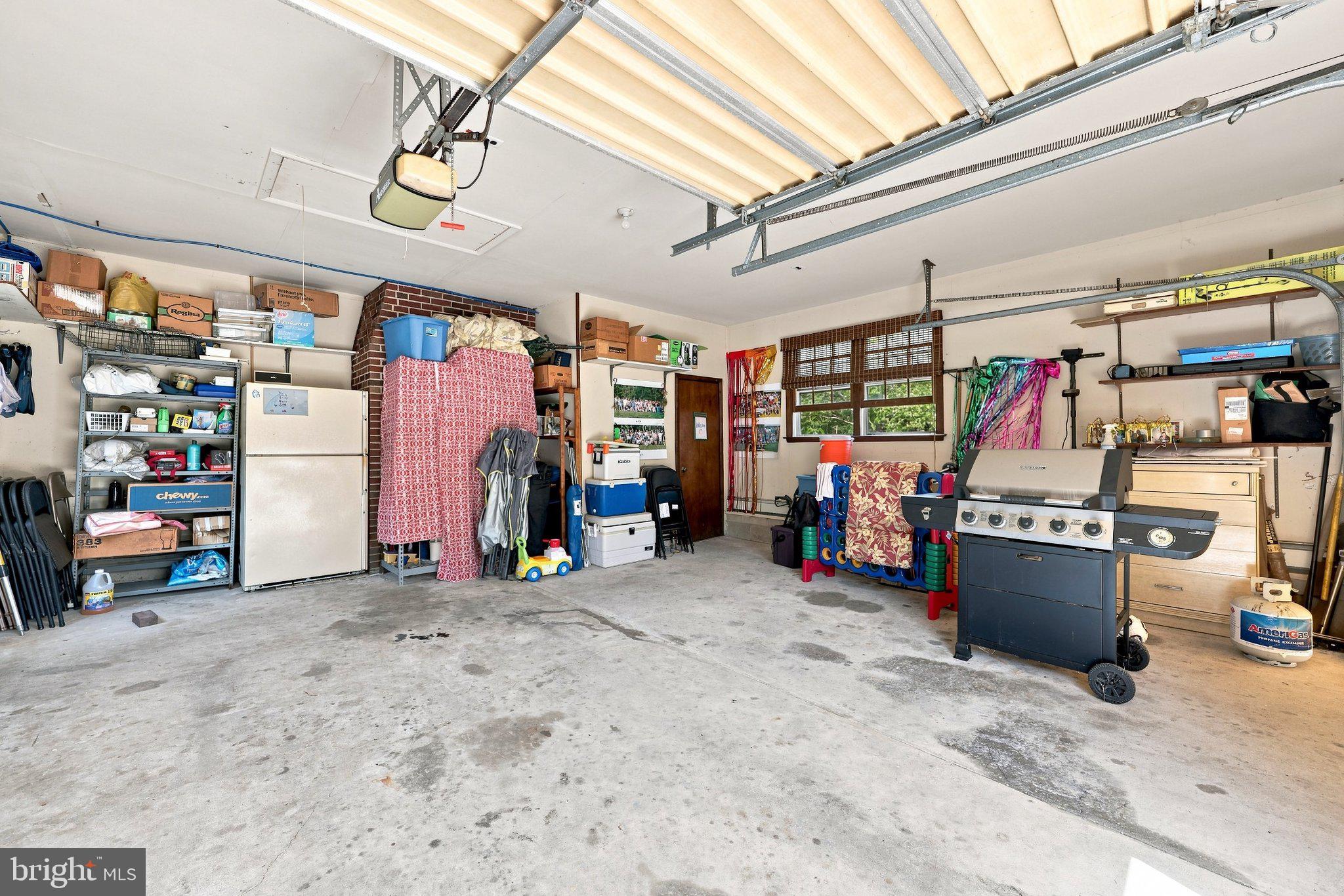 116 East Ridgewood Avenue Absecon, NJ 08205 - Photo 46 of 49 Spacious garage with organized storage.