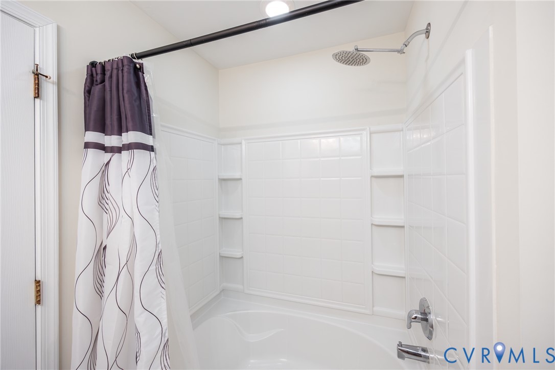 2928 Heather Ridge Drive Henrico, VA 23231 - Photo 29 of 34 Bathtub and shower combination featuring a rain sh