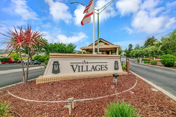 a sign that is on the side of a road