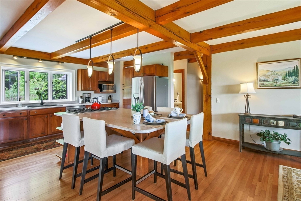 15 Allen Hill Road Princeton, MA 01541 - Photo 12 of 42 a dining room with furniture and wooden floor