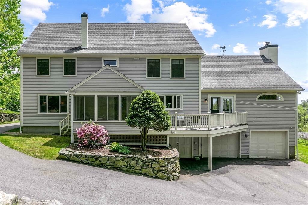15 Allen Hill Road Princeton, MA 01541 - Photo 33 of 42 a front view of a house with a yard and outdoor seating