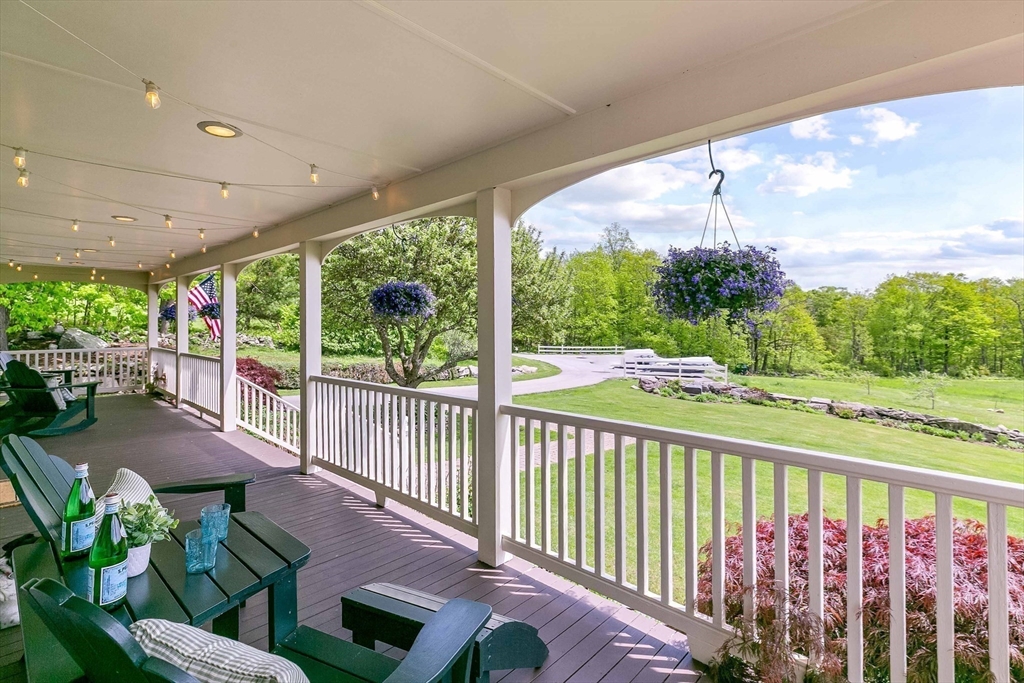 15 Allen Hill Road Princeton, MA 01541 - Photo 4 of 42 a view of a porch with furniture and garden