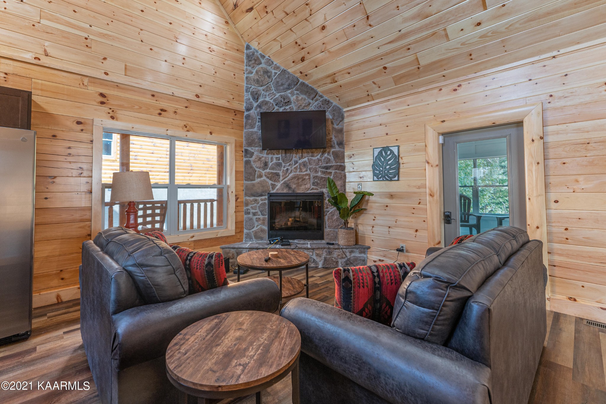 304 City View Way Sevierville, TN 37863 - Photo 3 of 34 a living room with furniture a fireplace and a flat screen tv