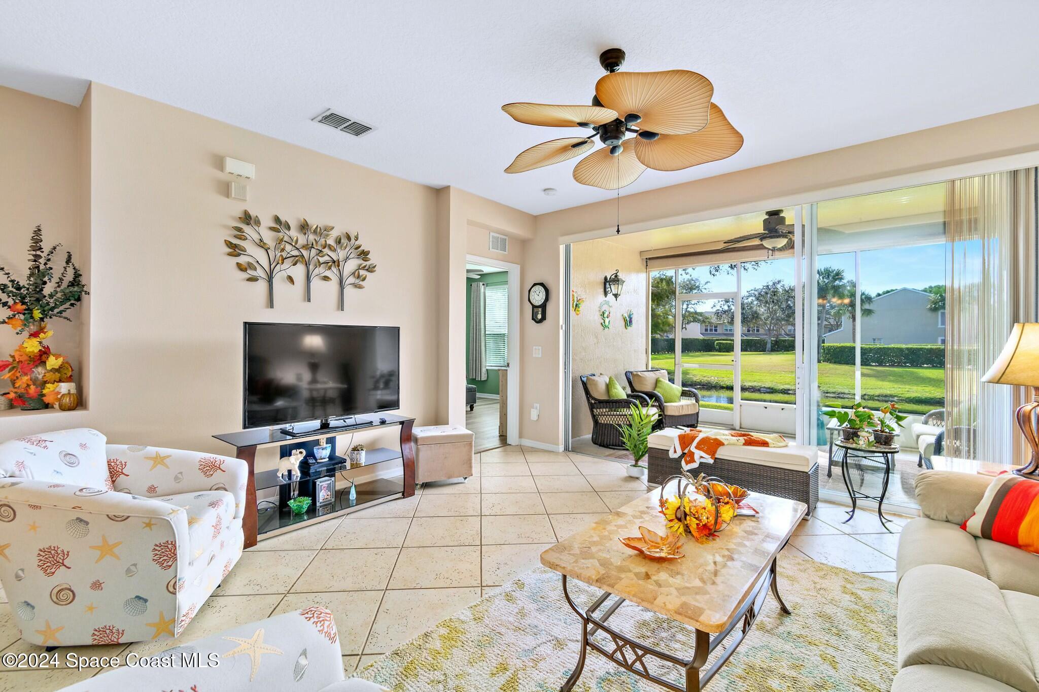 400 Trotter Lane, Unit 102 Melbourne, FL 32940 - Photo 21 of 51 Living Room