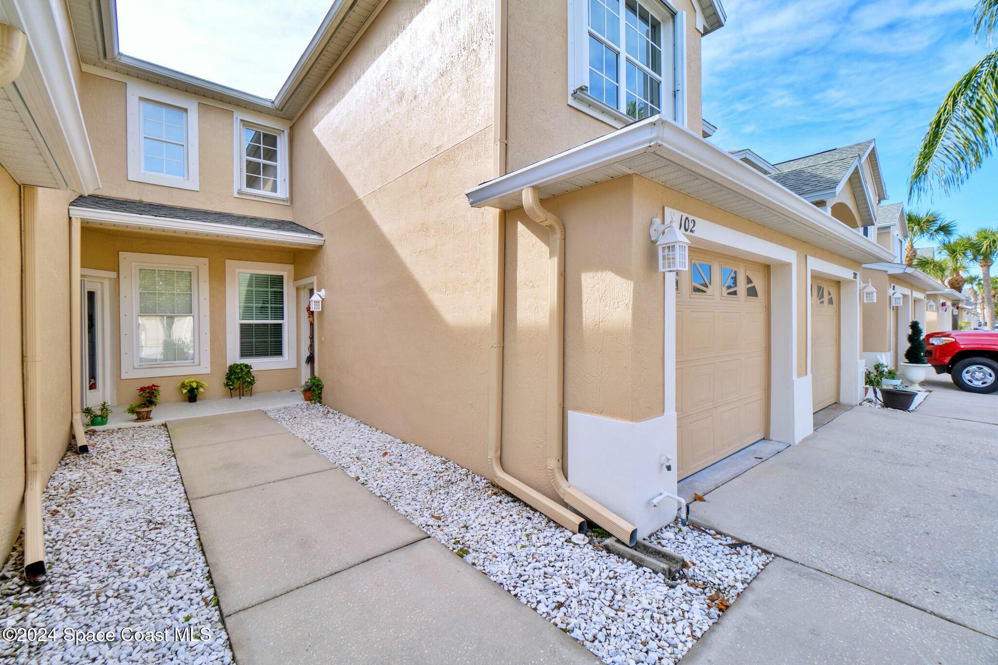 400 Trotter Lane, Unit 102 Melbourne, FL 32940 - Photo 5 of 51 Front Walkway