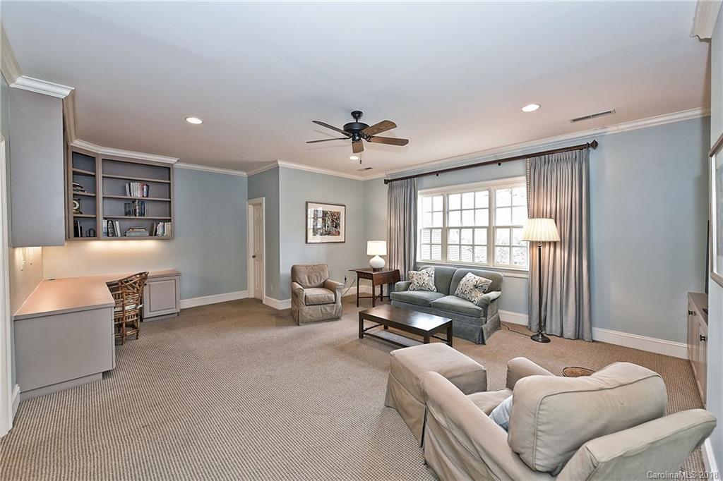 1912 Harris Road Charlotte, NC 28211 - Photo 22 of 36 a living room with furniture and a window