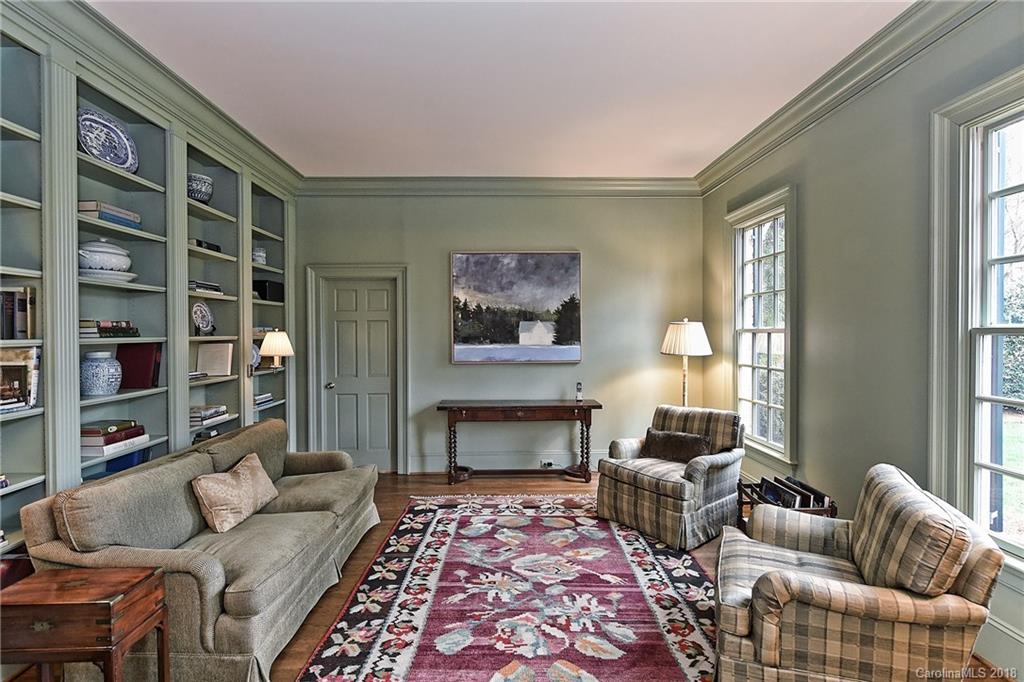 1912 Harris Road Charlotte, NC 28211 - Photo 5 of 36 a living room with furniture and a fireplace