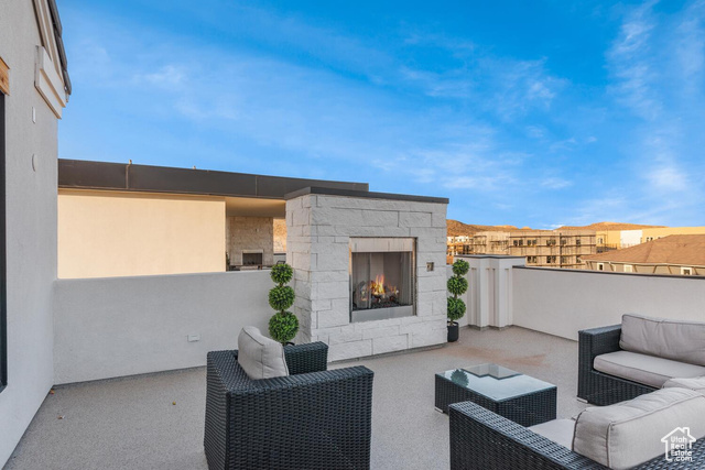5367 Cyan Lane St. George, UT 84790 - Photo 30 of 36 View of patio featuring an outdoor living space with a fireplace