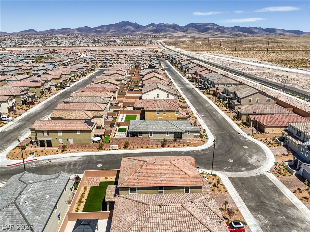 3782 Alla Rocca Avenue Henderson, NV 89044 - Photo 50 of 55 An aerial view showcases a residential neighborhood with vast mountain views.