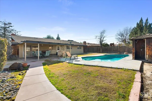 a view of a house with swimming pool