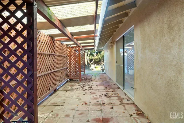a view of a pathway of a house with wooden floor