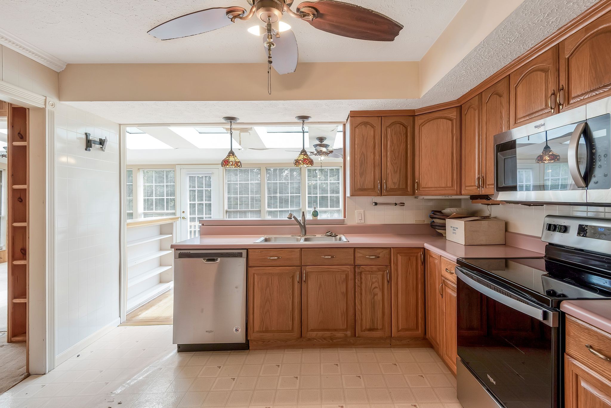 4848 Concord Drive Hermitage, TN 37076 - Photo 12 of 42 a kitchen with stainless steel appliances a sink stove and cabinets