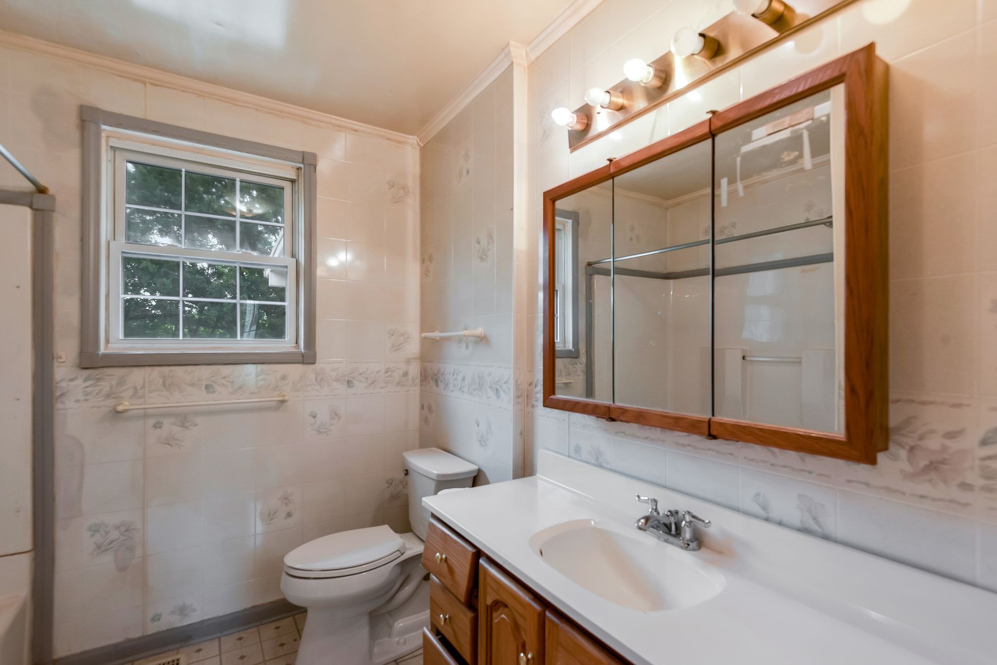 4848 Concord Drive Hermitage, TN 37076 - Photo 15 of 42 a bathroom with a sink and a toilet