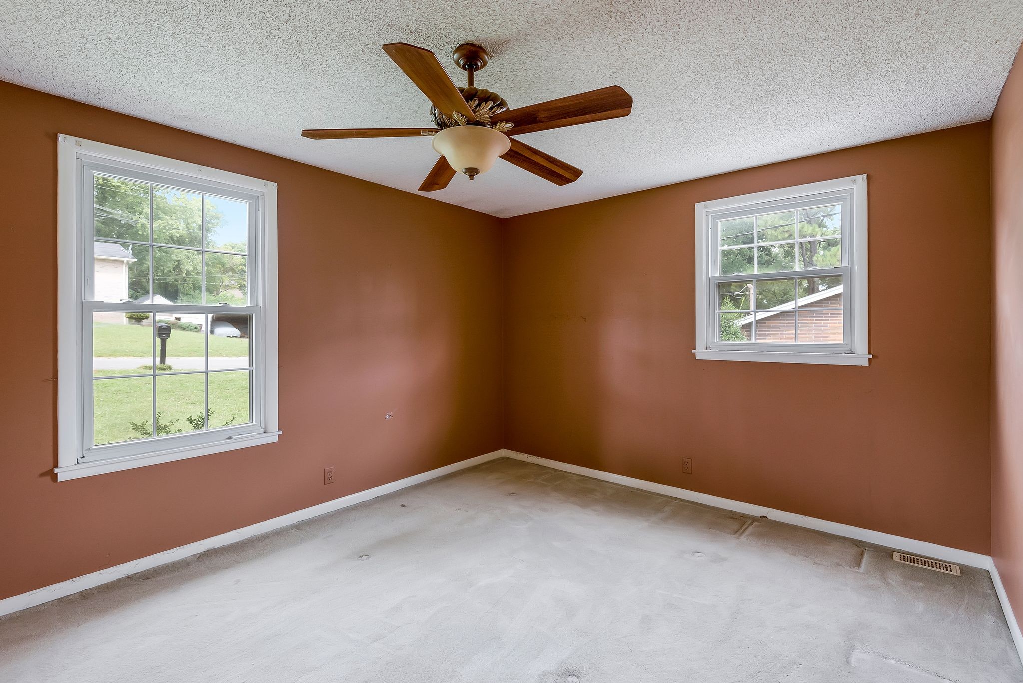 4848 Concord Drive Hermitage, TN 37076 - Photo 18 of 42 an empty room with ceiling fan and windows