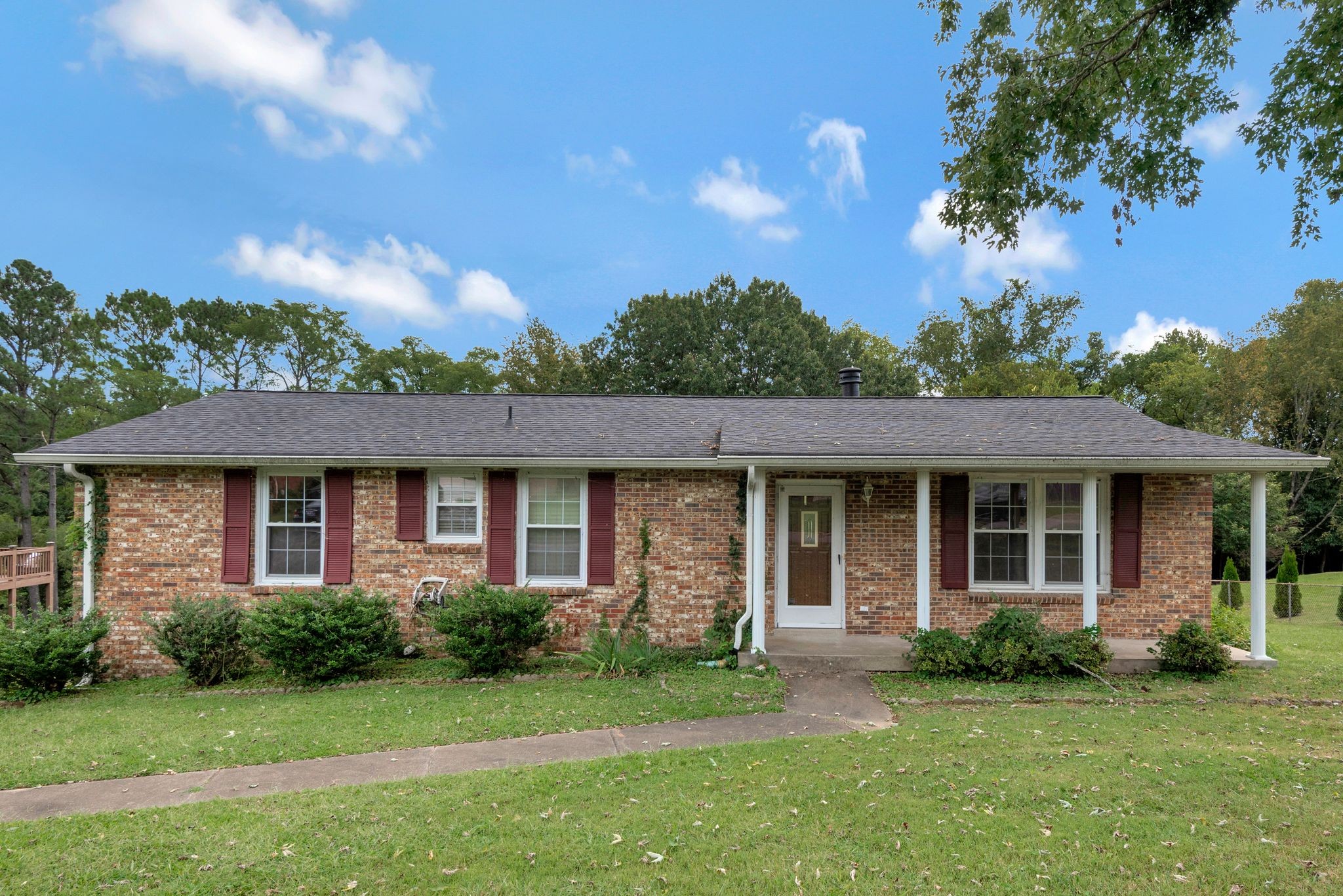 4848 Concord Drive Hermitage, TN 37076 - Photo 2 of 42 a front view of a house with a garden