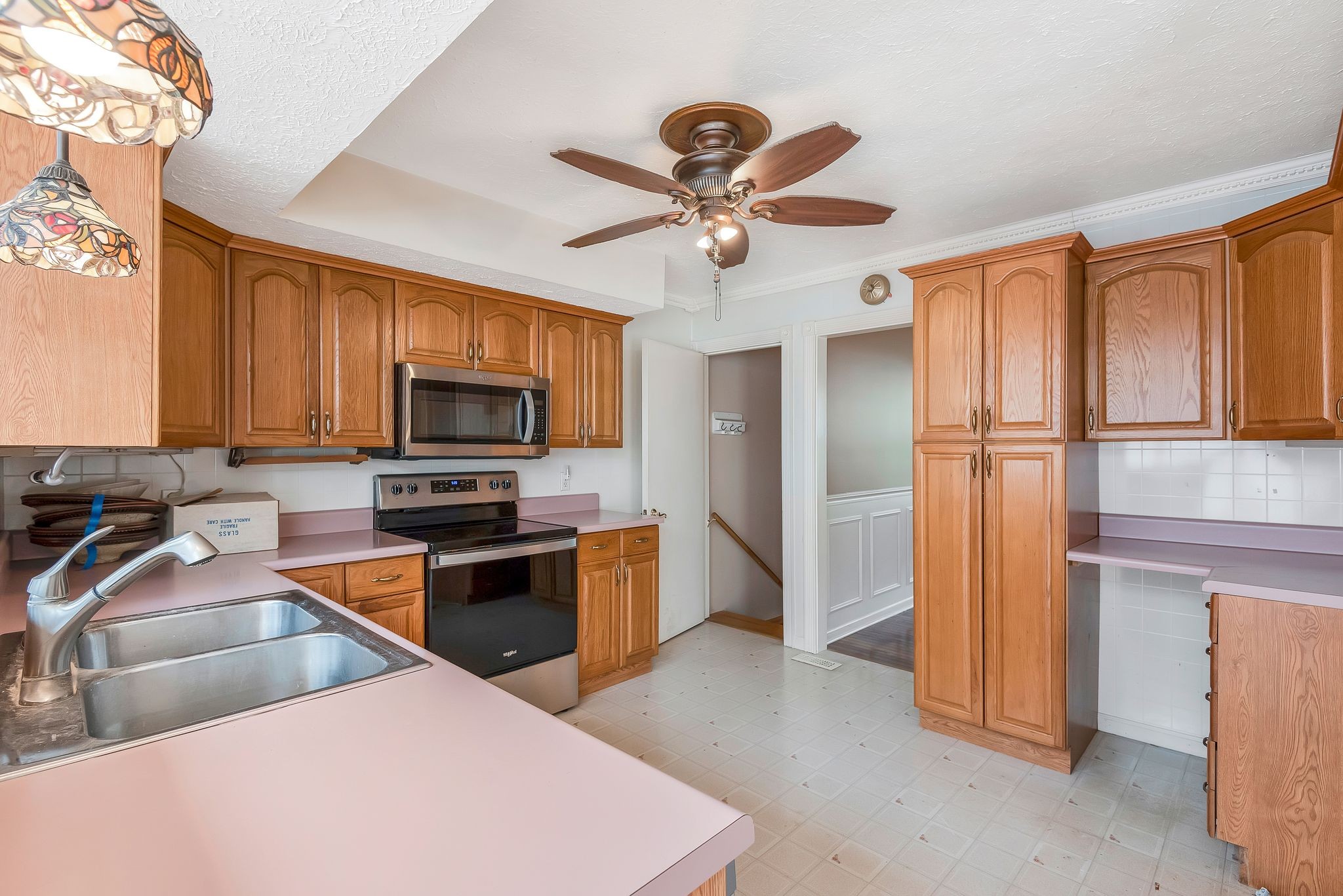 4848 Concord Drive Hermitage, TN 37076 - Photo 10 of 42 a kitchen with stainless steel appliances a stove microwave and refrigerator