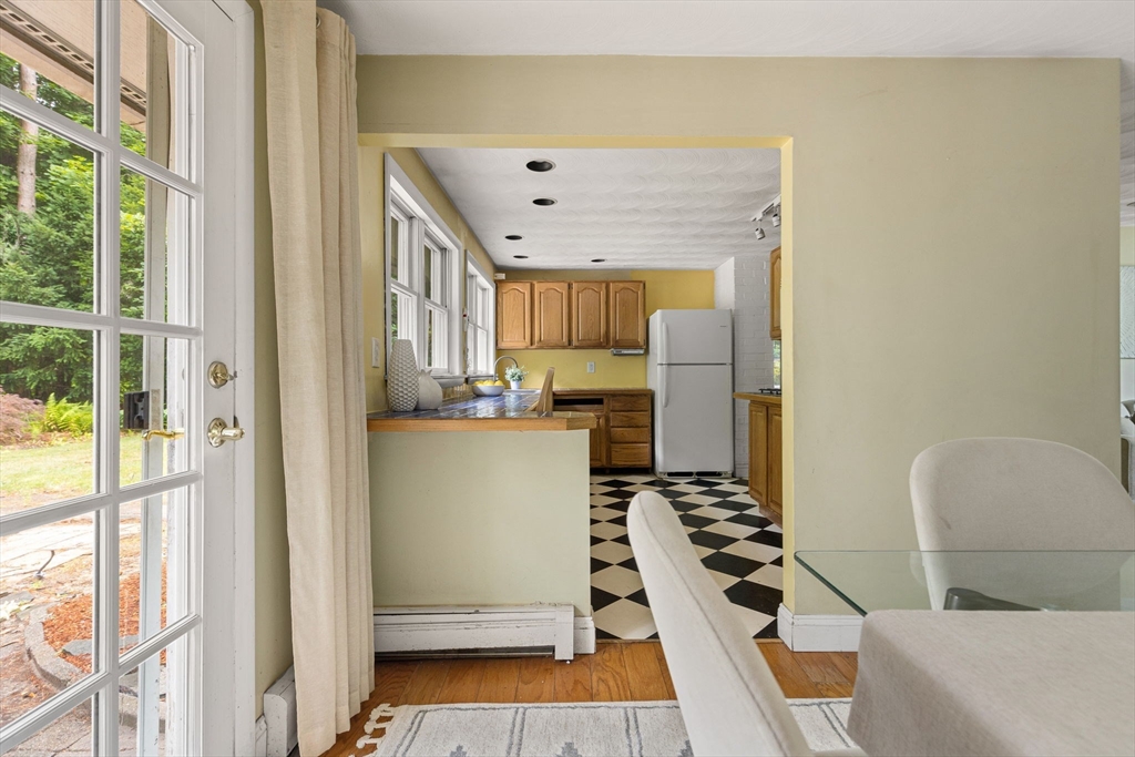 12 Janet Road Chelmsford, MA 01824 - Photo 7 of 21 a kitchen with a refrigerator and a stove top oven
