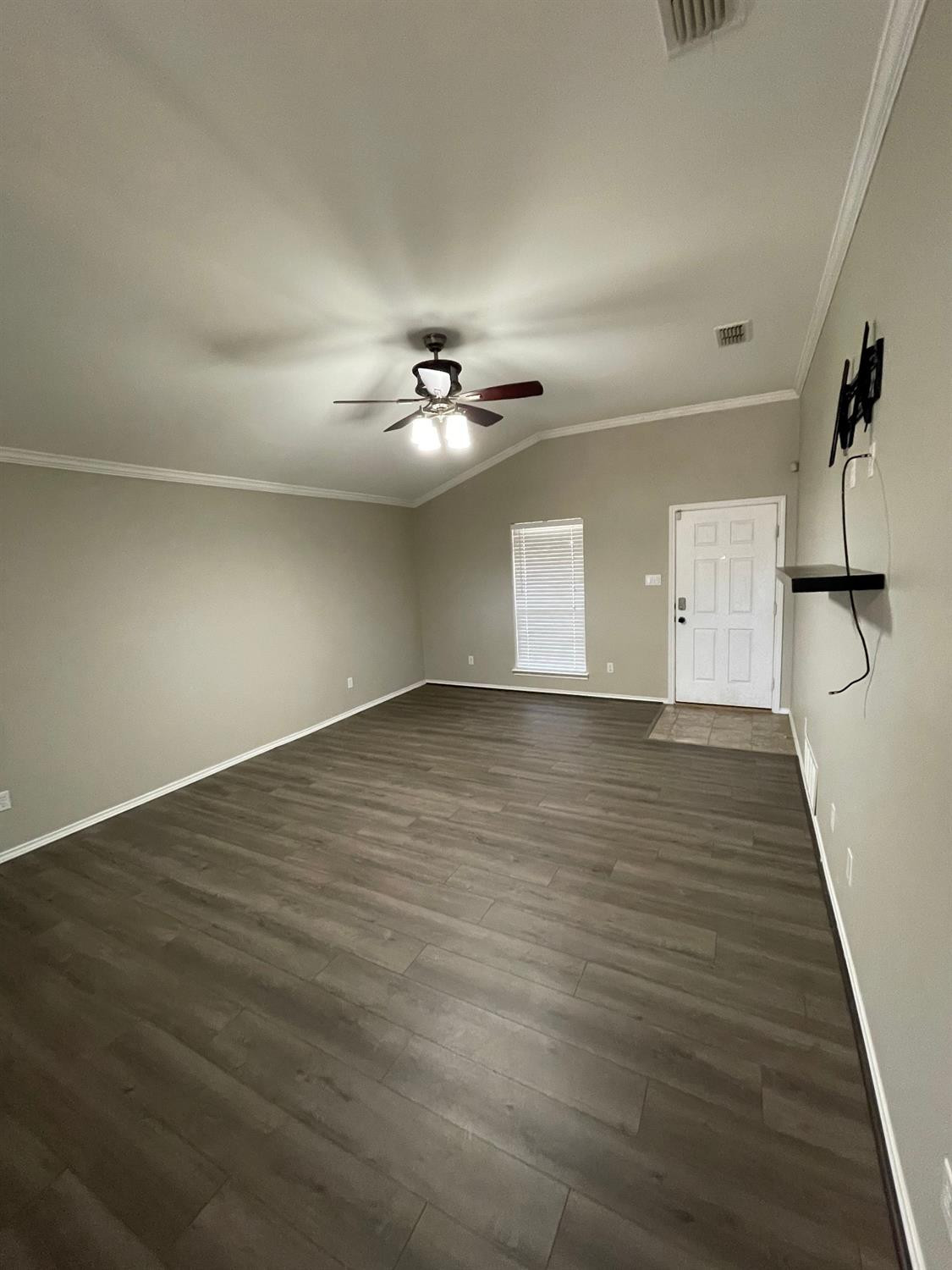 1903 99th Place Lubbock, TX 79423 - Photo 2 of 10 a view of a room with wooden floor