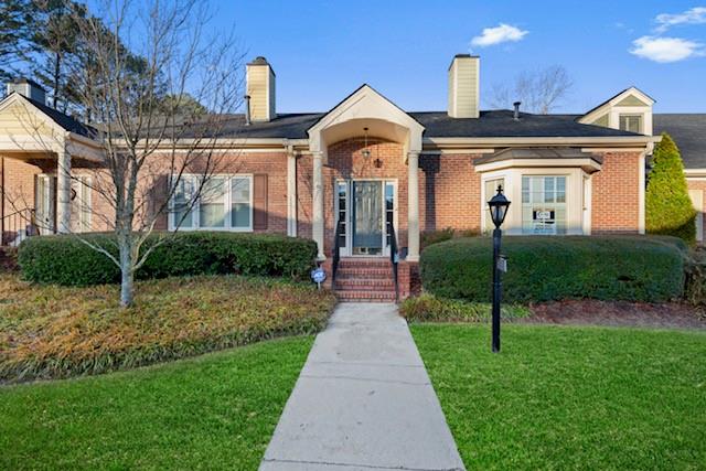 1436 Winston Place Decatur, GA 30033 - Photo 1 of 1 a front view of a house with garden