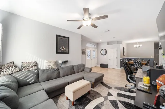 a view of livingroom with furniture and wooden floor