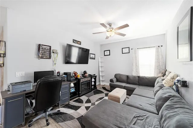 a view of an empty room with a window
