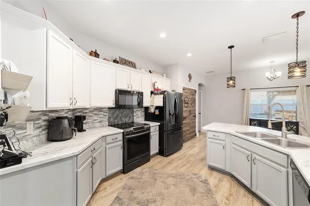 a view of a living room and a large window