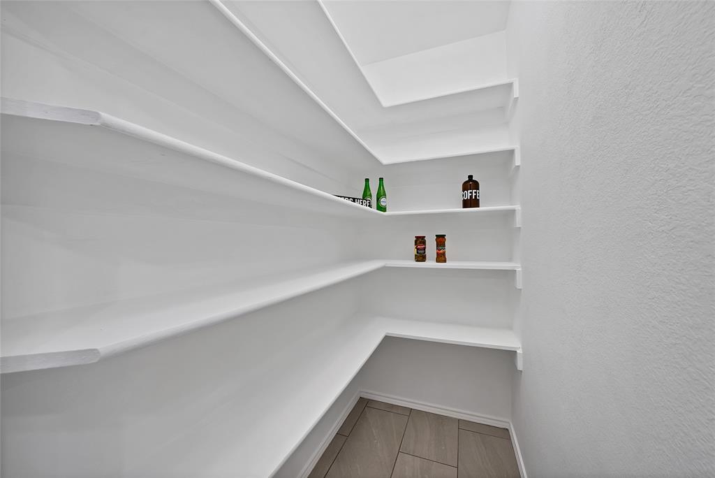 308 South Chestnut Street Forney, TX 75126 - Photo 11 of 25 a view of an empty walk in closet