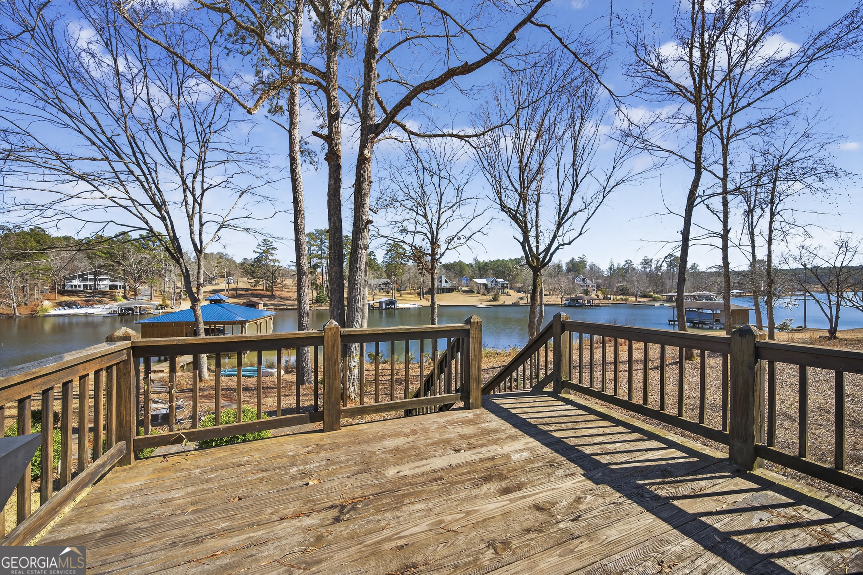 392 Hub Dent Road Northeast Milledgeville, GA 31061 - Photo 13 of 66 a view of wooden deck with a trees