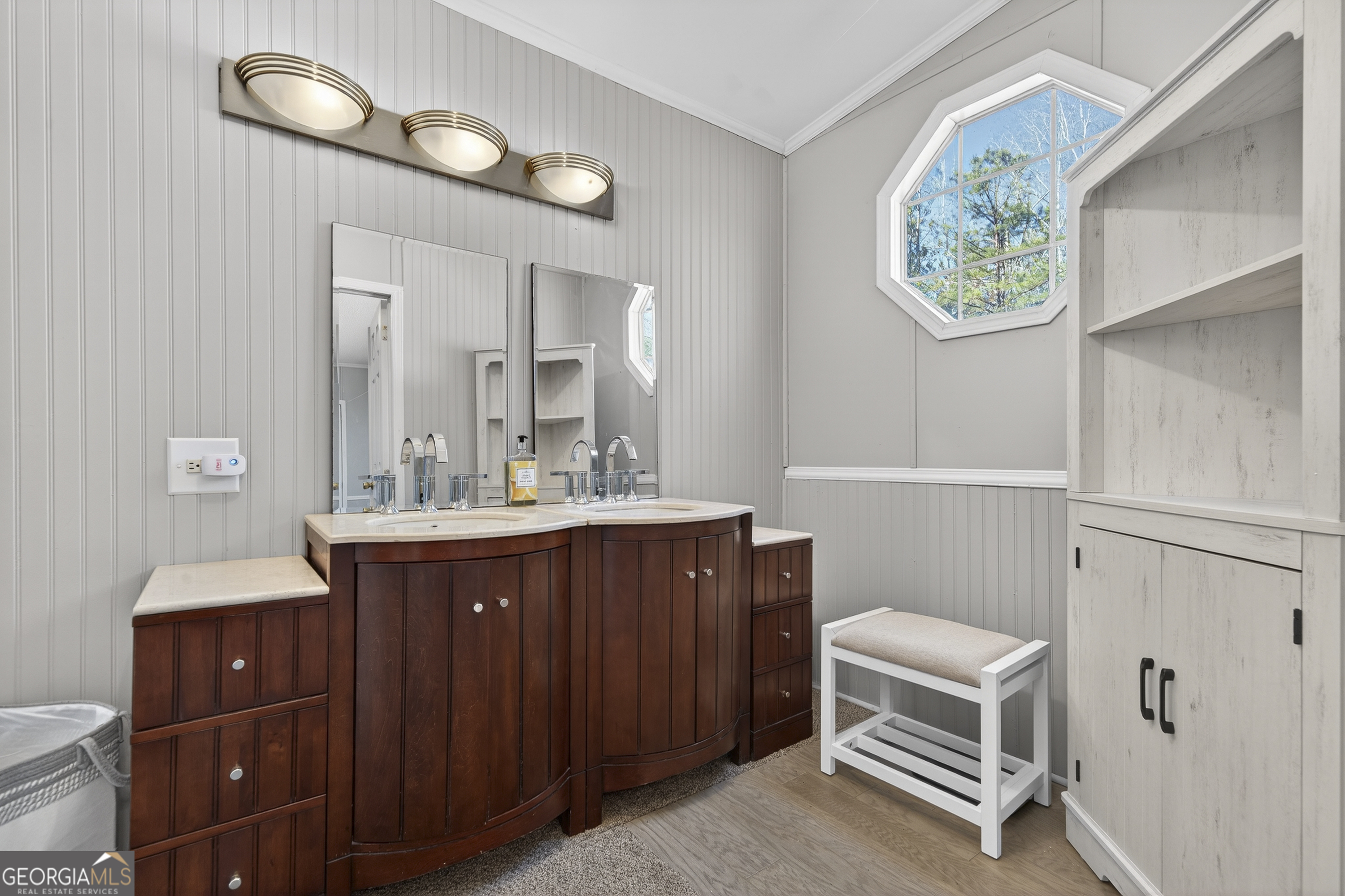 392 Hub Dent Road Northeast Milledgeville, GA 31061 - Photo 38 of 66 a spacious bathroom with a double vanity sink and a mirror