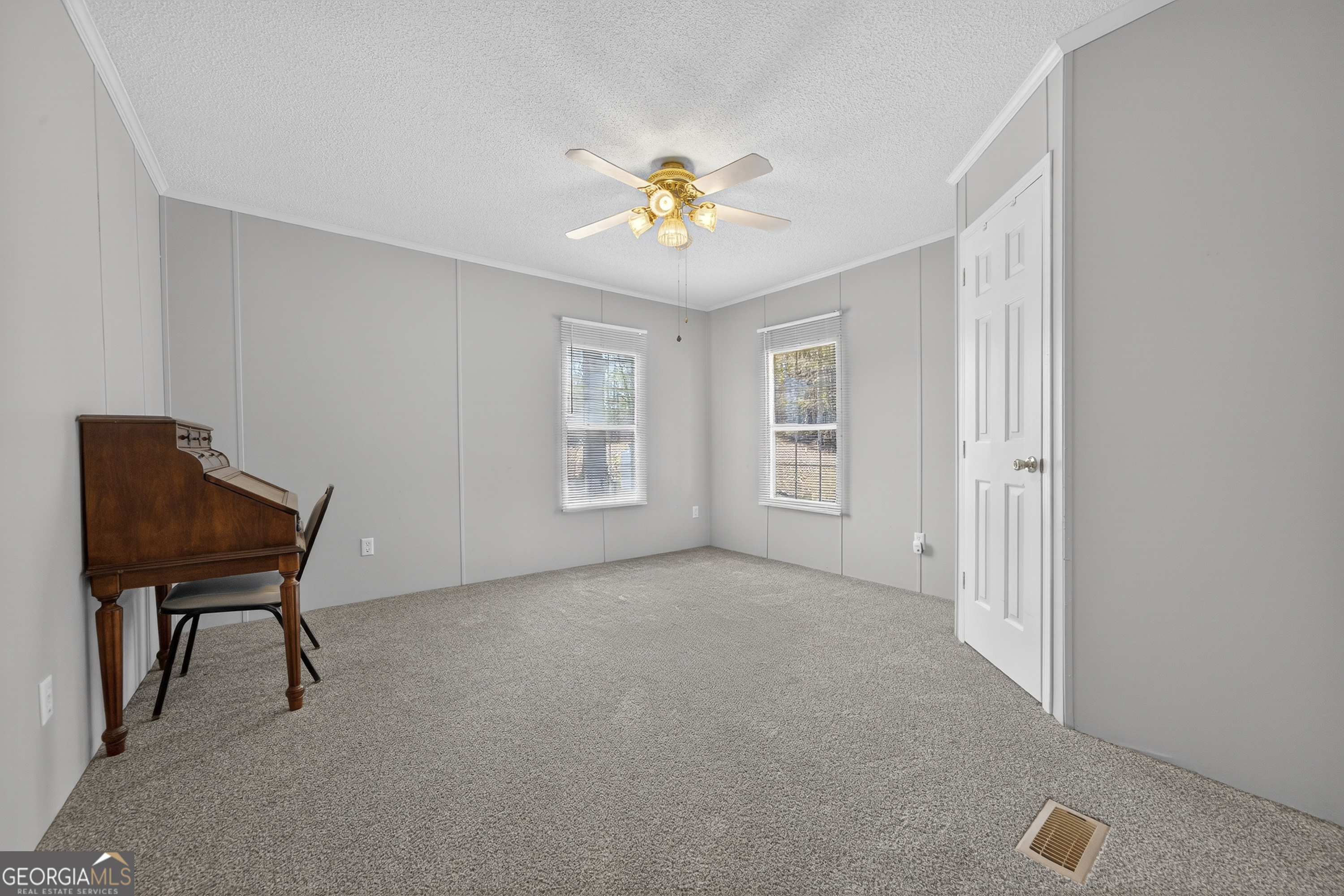 392 Hub Dent Road Northeast Milledgeville, GA 31061 - Photo 48 of 66 a view of an empty room with a window