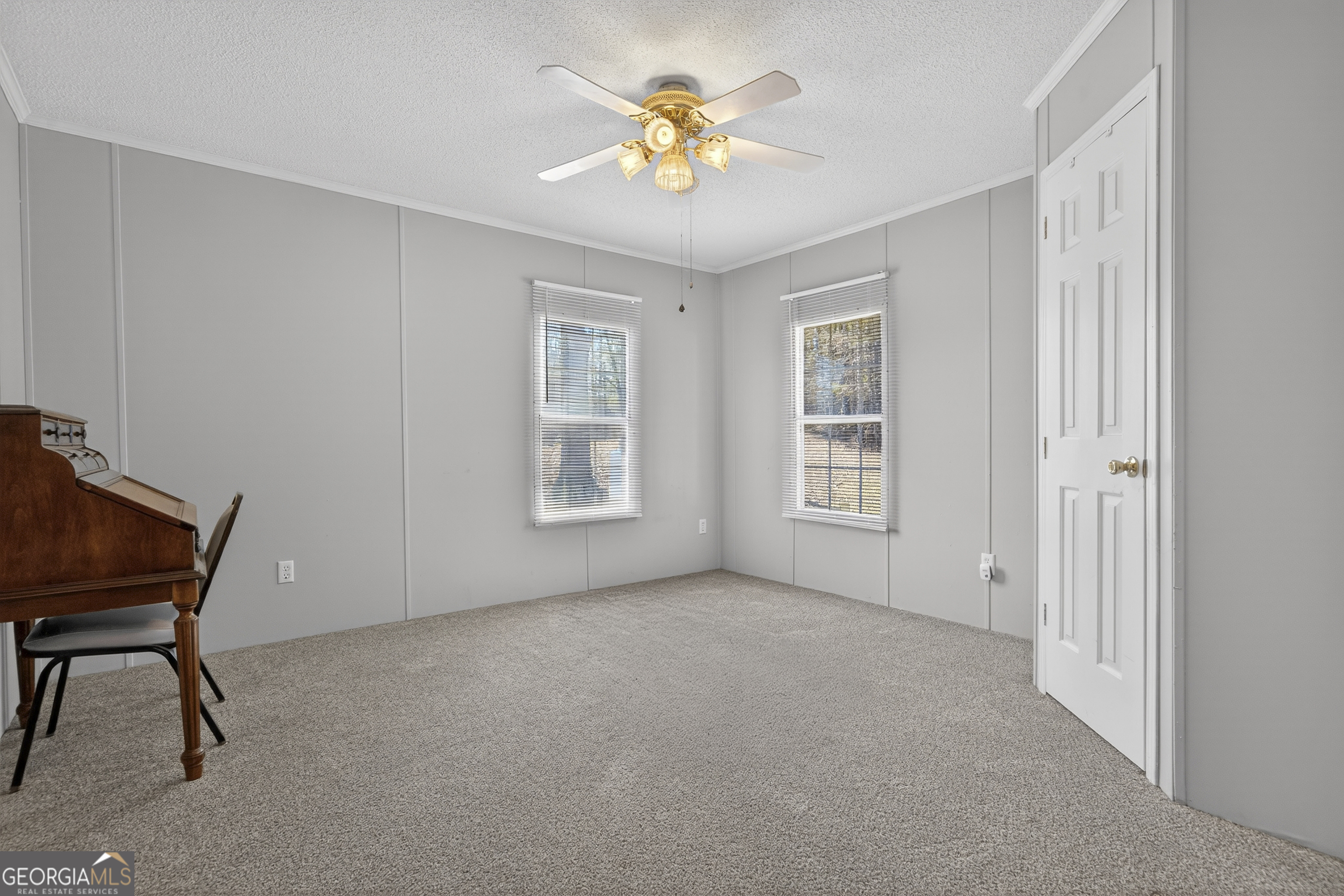 392 Hub Dent Road Northeast Milledgeville, GA 31061 - Photo 49 of 66 a view of an empty room with a window