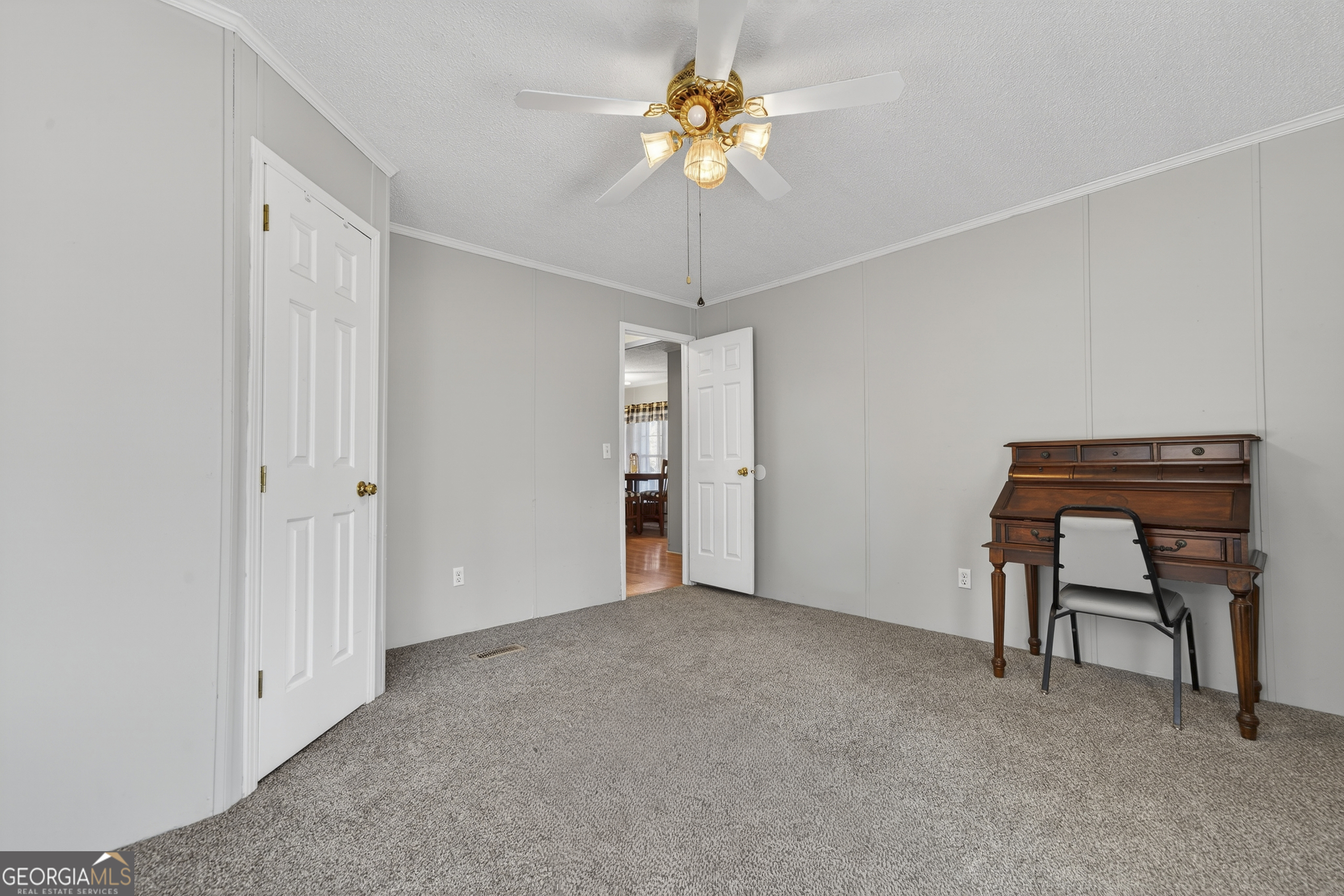 392 Hub Dent Road Northeast Milledgeville, GA 31061 - Photo 50 of 66 a view of an empty room with a window