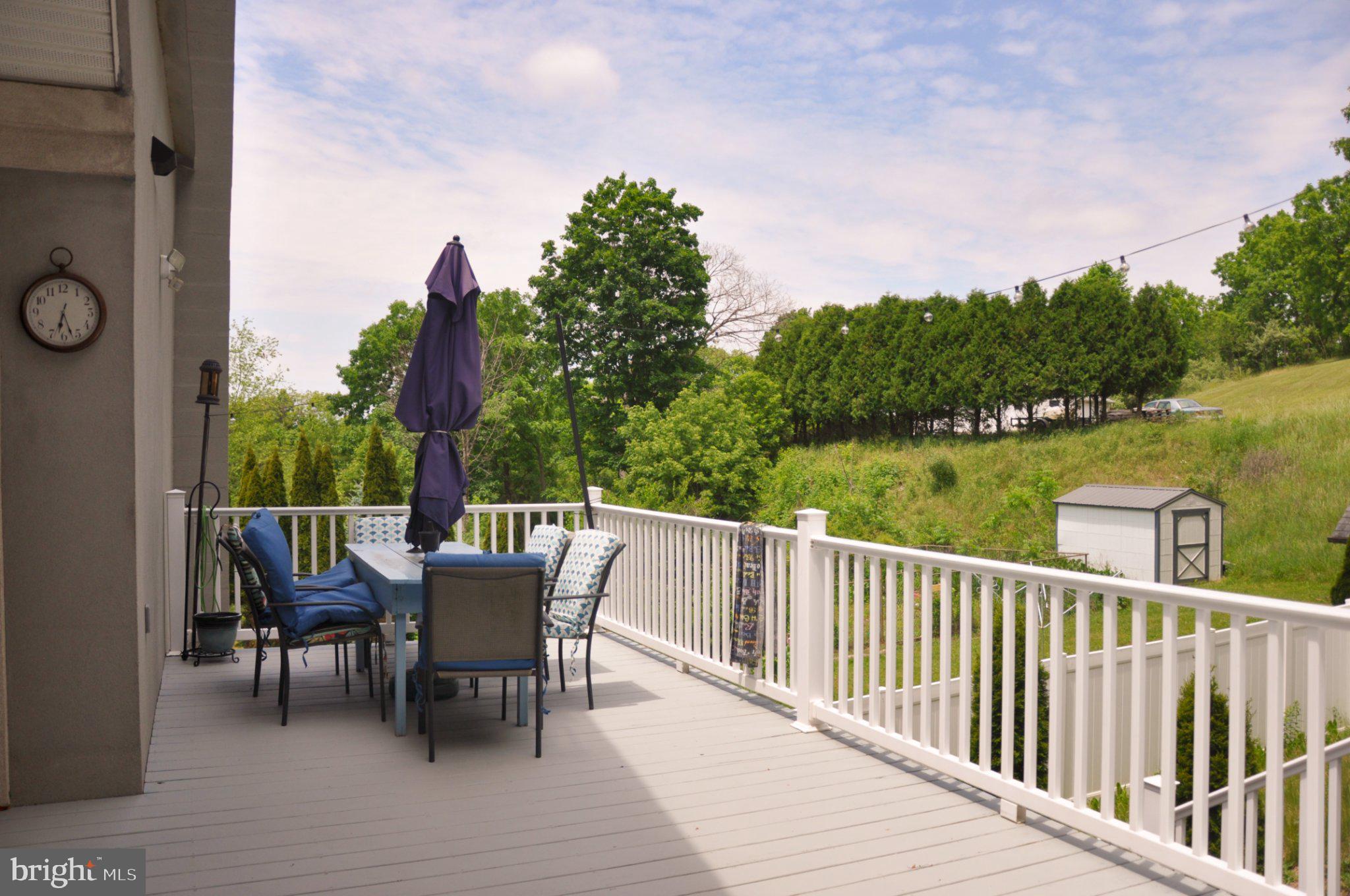 321 Mount Nittany Road Lemont, PA 16851 - Photo 41 of 48 Serene deck with lush green views.