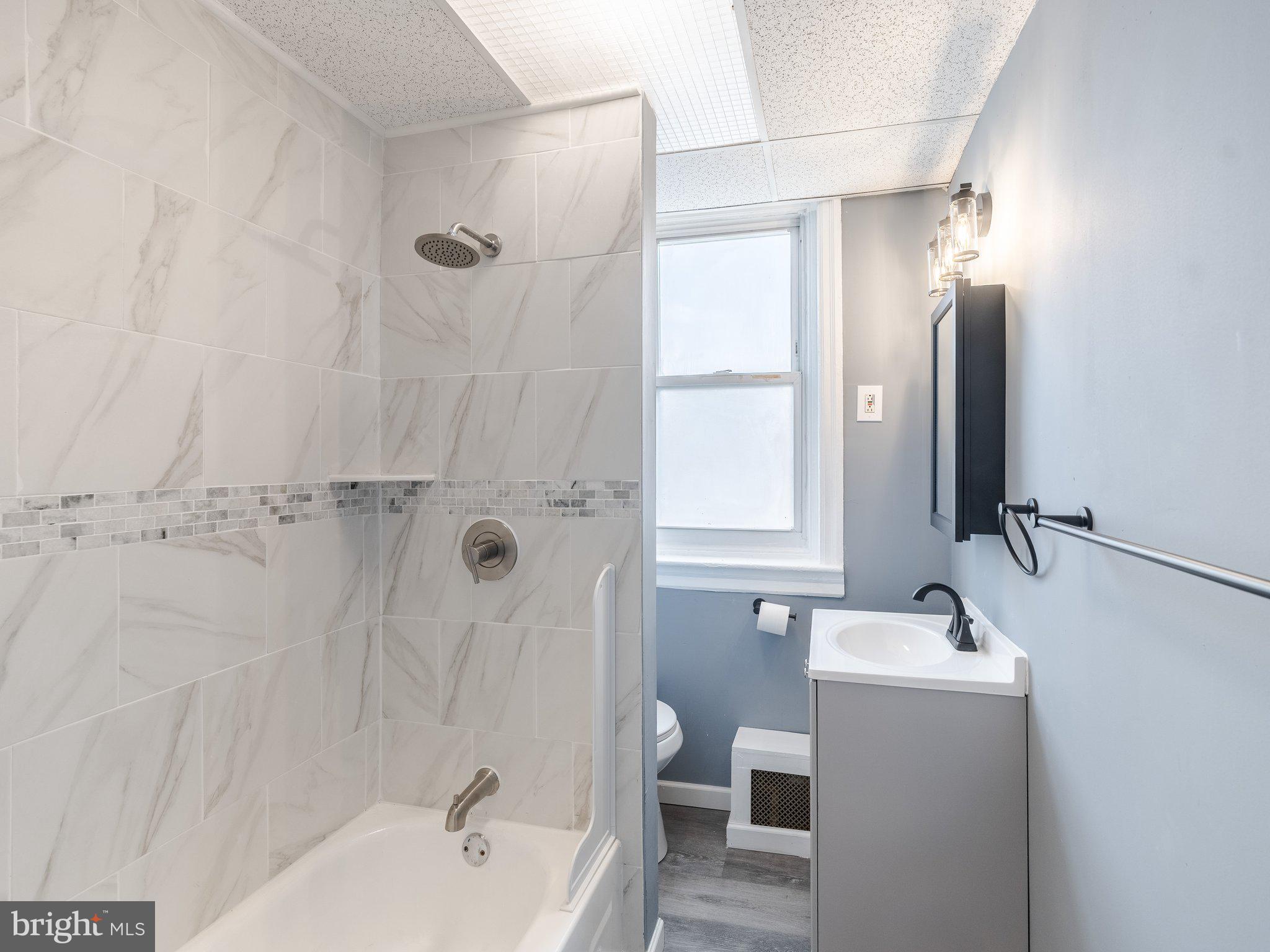 1823 South Yewdall Street Philadelphia, PA 19143 - Photo 18 of 21 Modern bathroom with sleek finishes.