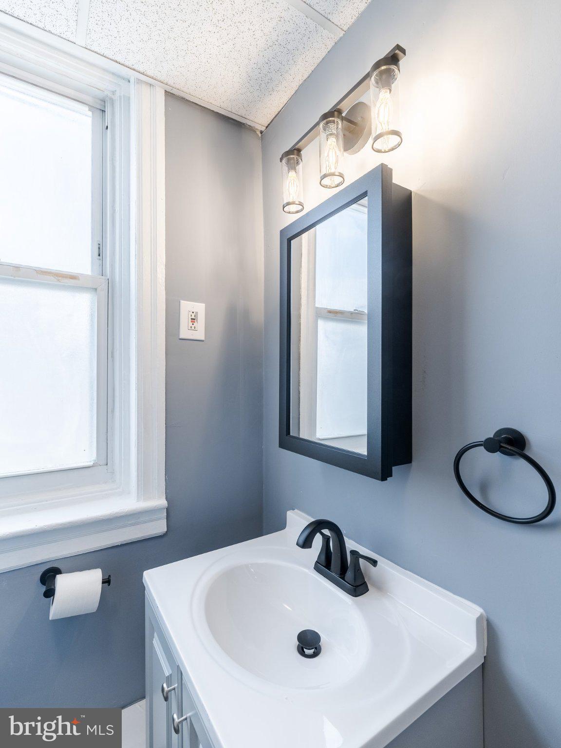 1823 South Yewdall Street Philadelphia, PA 19143 - Photo 19 of 21 Sleek bathroom with modern accents.